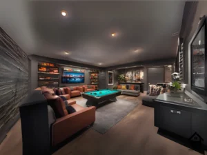 A modern basement game room featuring a home theater setup, mini bar, and gaming area, designed for versatile entertainment